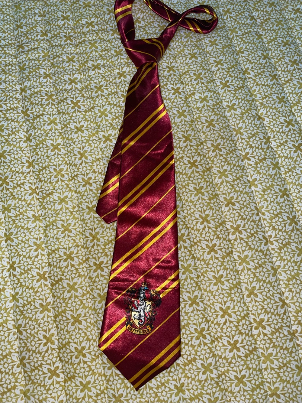 Burgundy and Gold Gryffindor Harry Potter tie.